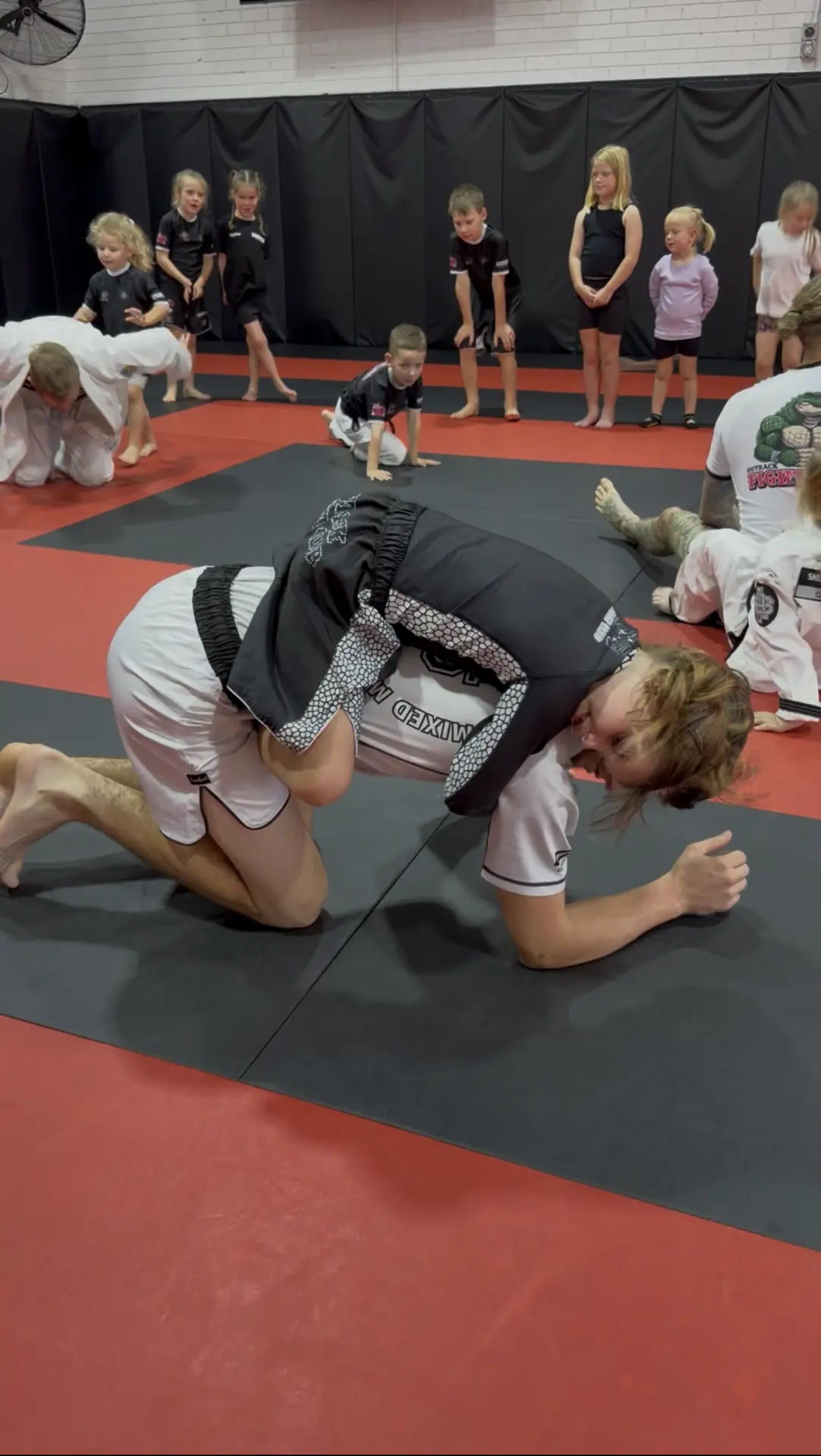 Kids and coaches drilling together on the mats at Shepparton Jiu-Jitsu