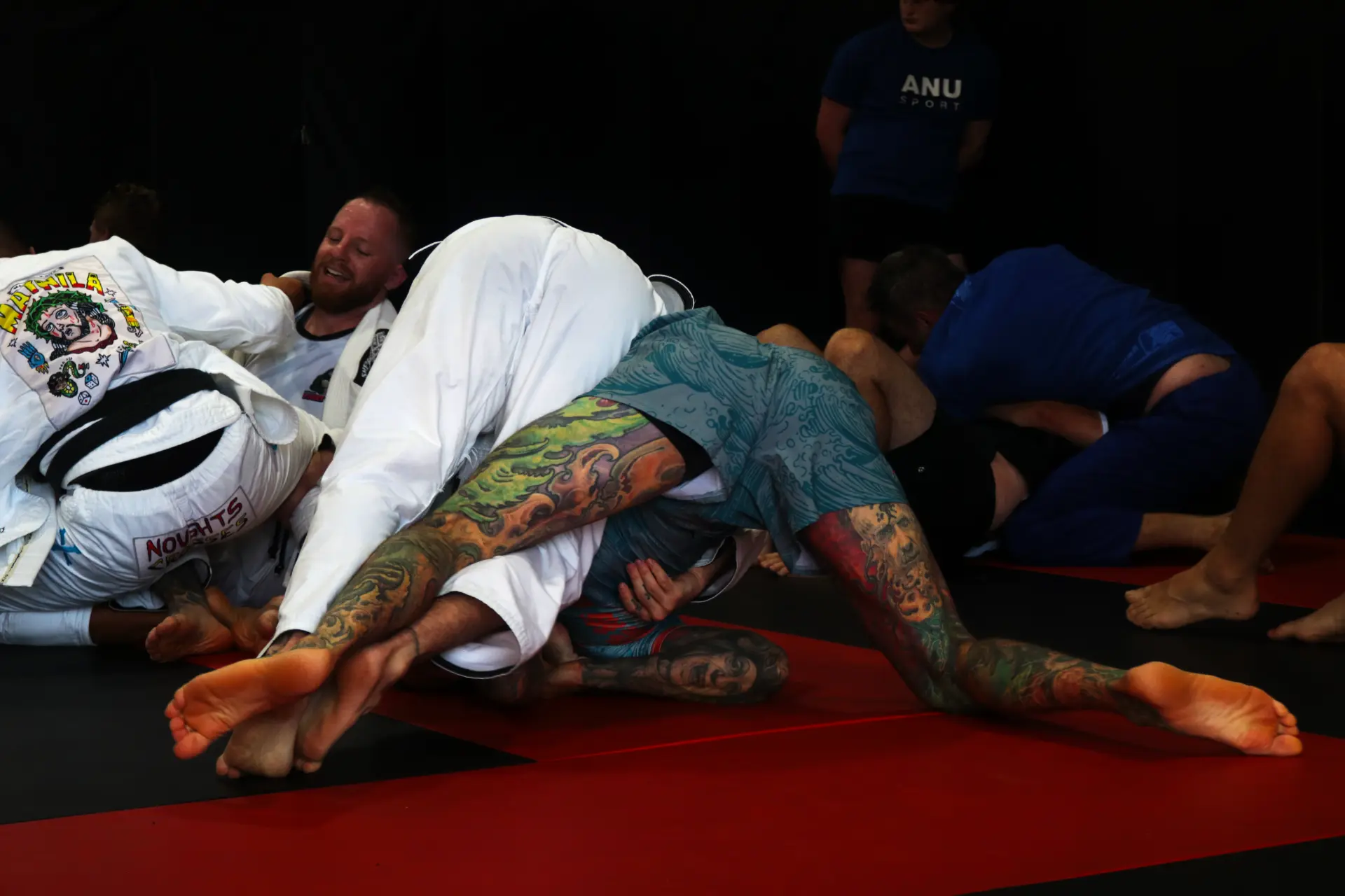 Members rolling together on the mats at Shepparton Jiu-Jitsu